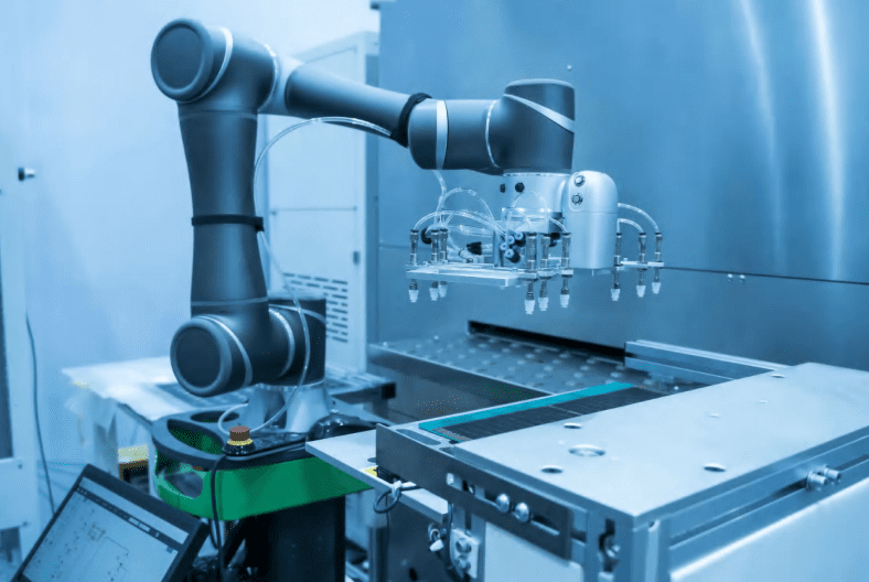 Industrial robotic arm handling materials in a manufacturing setting.