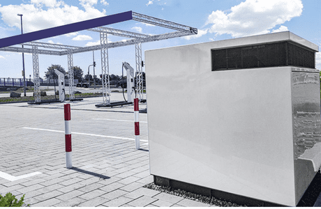 A modern toll booth and barrier system with no vehicles present.
